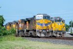 Two UP trains wait to head west at Rosenberg 